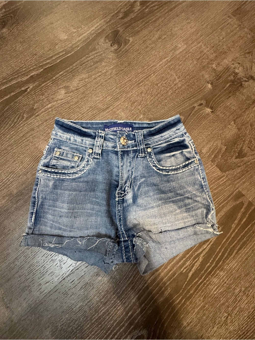 Light Blue Distressed Denim Cutoff Shorts